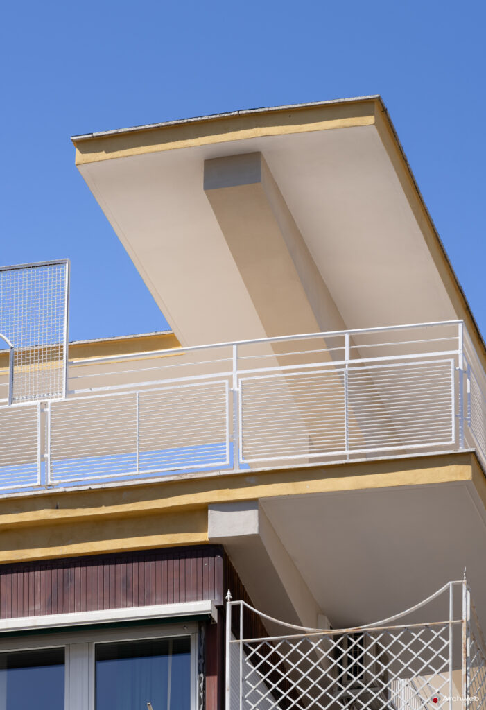 Detail of the balconies and the connection to the sky of the Cassiopea building on Via Archimede
