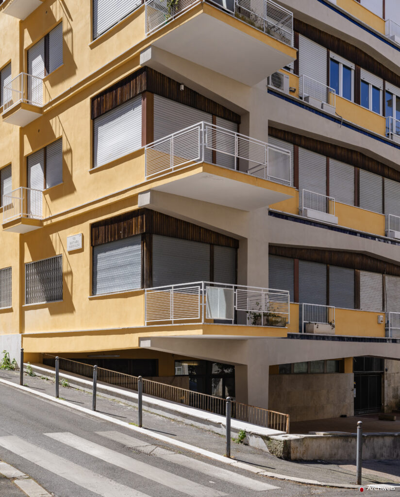 Detail of the corner of the Cassiopea building at the intersection of Via Archimede and Via Barnaba Tortolini