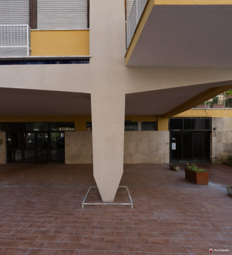 Detail of one of the pilotis at the base of the main facade of the Cassiopea building in Via Archimede