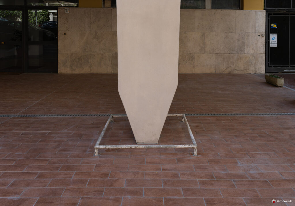 Detail of one of the pilotis at the base of the main facade of the Cassiopea building in Via Archimede