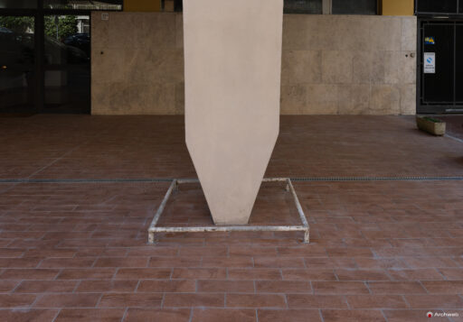 Detail of one of the pilotis at the base of the main facade of the Cassiopea building in Via Archimede